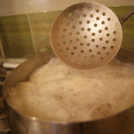 skimming boiling pea