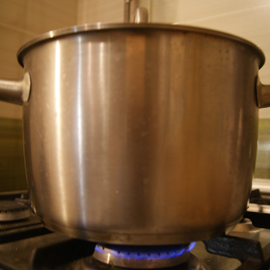 rich broth is boiling under a lid