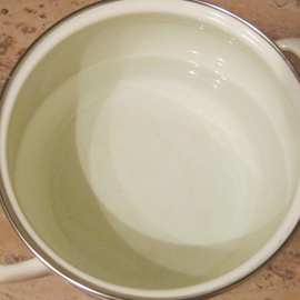 pour water in a pot